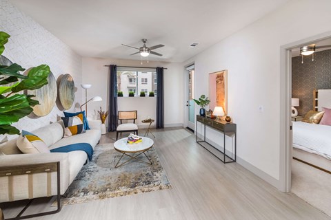 a living room with a couch and a table
